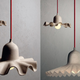 Illustration for article titled 8 Amazingly Clever Lamps Made From Plain Old Cardboard